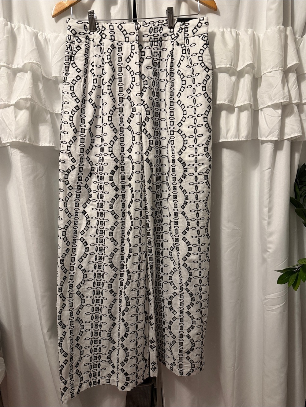 Express black and white eyelet cutout wide leg pants. New with tags!